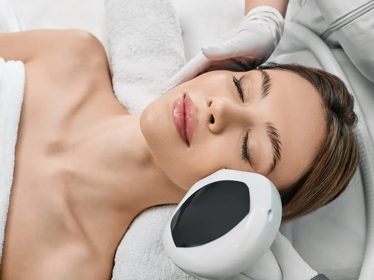Woman relaxed receiving IPL photofacial treatment in Jacksonville, FL