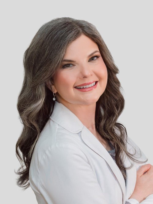 Portrait of Elizabeth Anderson, MMS, PA-C, in a white coat