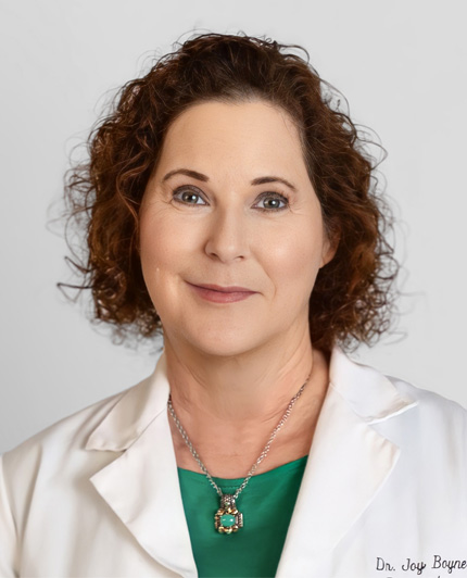 Portrait of Dr. Joy R. Boyne, MD, in a white coat